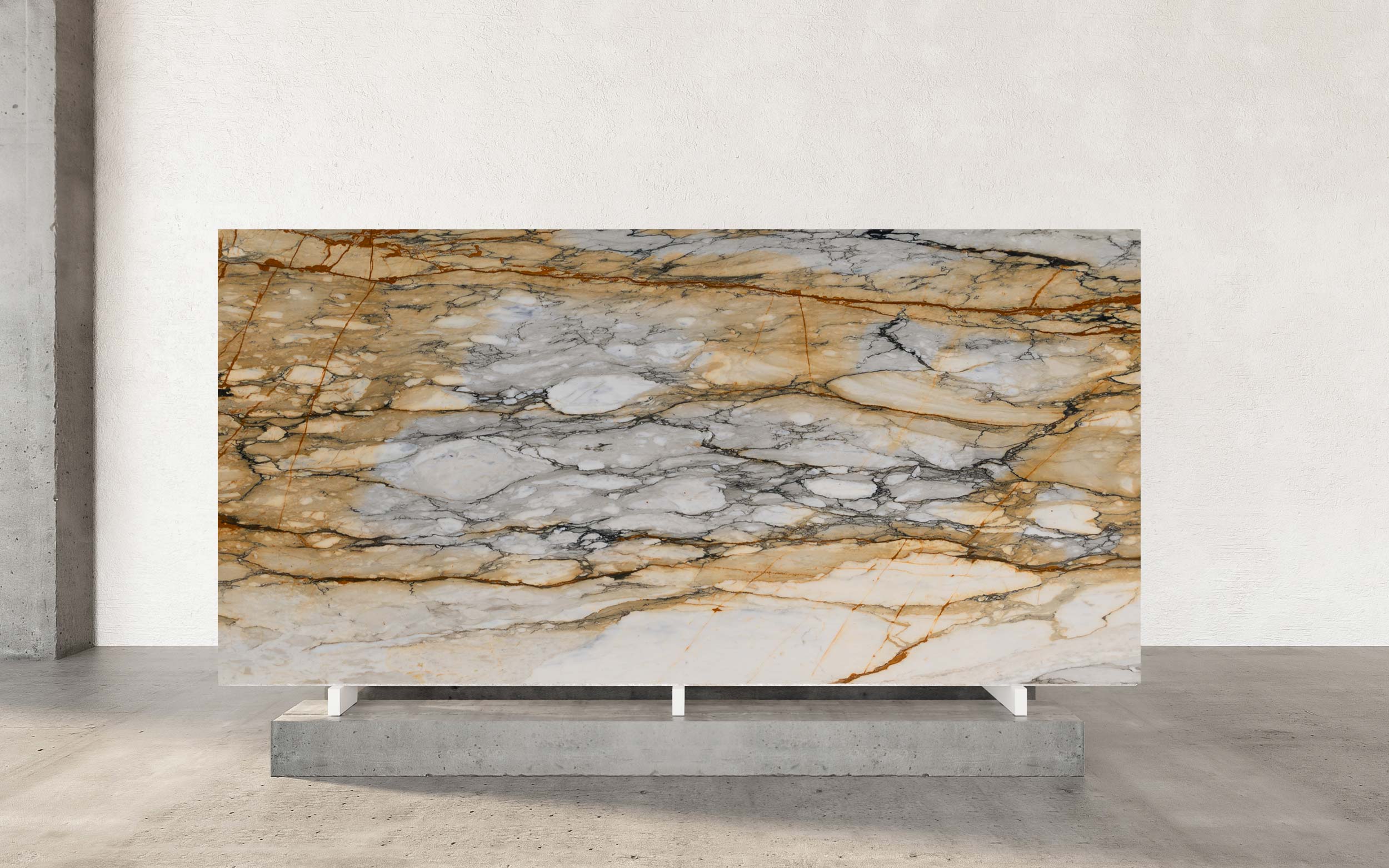 Calacatta Macchia Vecchia Marble, a classic Italian marble known for its timeless elegance and visual impact, is sourced from quarries that are deeply ingrained in Italy's rich cultural heritage. This marble variety features soft, velvety grey bolts and veins that elegantly sweep across a ground of exquisite beauty, creating a captivating display of natural artistry. With a harmonious blend of earthy taupe hues and cool grey tones, Calacatta Macchia Vecchia Marble boasts a visually stunning gravelly palette that exudes a sense of luxury and sophistication. The pronounced veining patterns, characterized by bands of gold and grey on a crisp white background, make this marble a standout choice for those seeking to elevate their interiors with a touch of opulence.