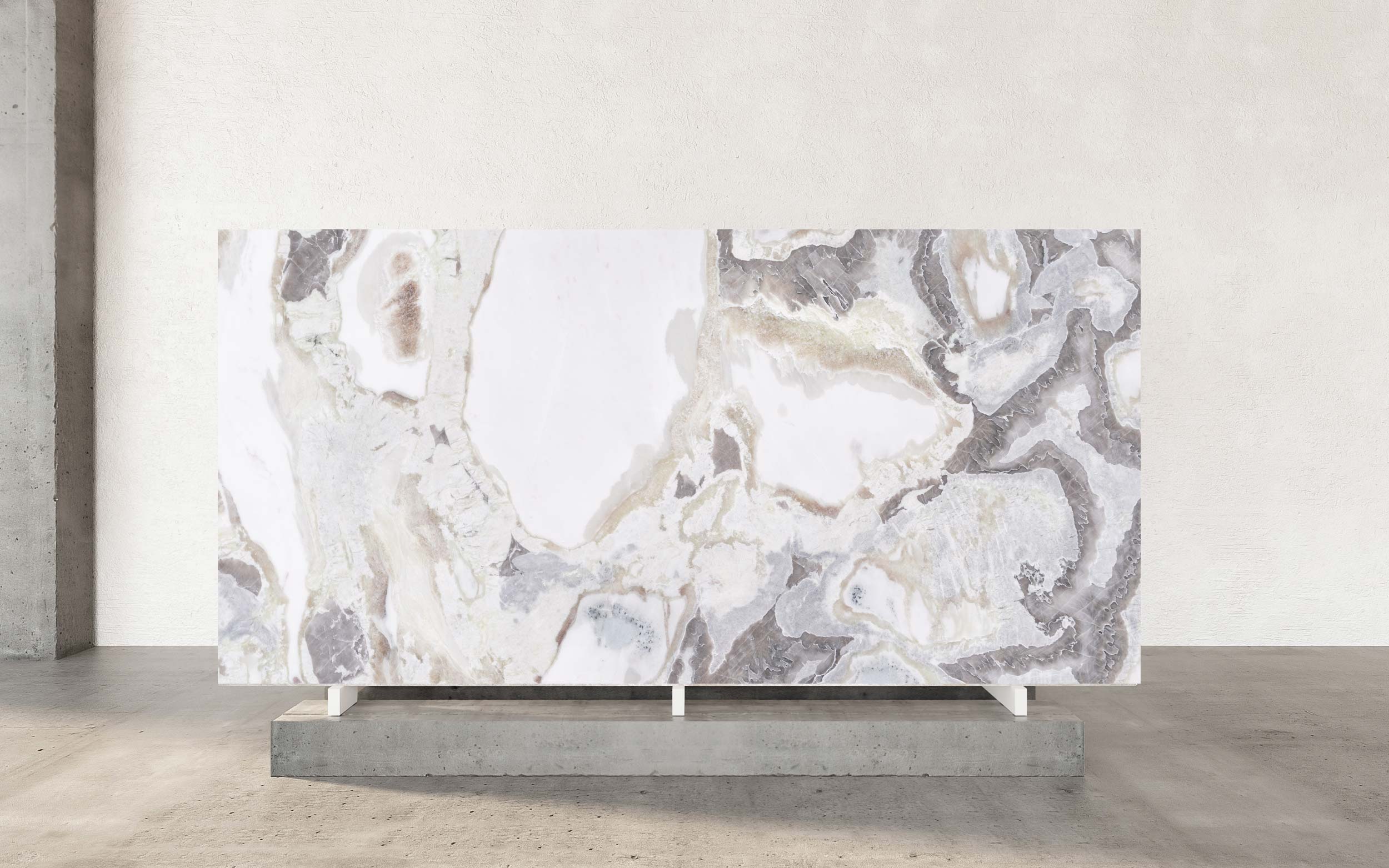 Oyster 101 marble features a soft, creamy white background with gentle grey or beige veining. This delicate color palette creates a serene and sophisticated aesthetic, suitable for a wide range of design styles. Oyster 101 marble is often available in both polished and honed finishes. The polished finish enhances its natural luster and highlights the delicate veining, while the honed finish offers a more matte appearance, providing a softer and more understated look.
