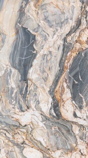 Tempest Crystal Polished Quartzite captivates with its powerful natural artistry, anchored by a deep, dark grey base. This stone stands out for its excessive, intertwining veining, creating a visual landscape that is both intricate and compelling. The polished finish reveals a striking array of prominent white, warm light brown, and bold yellow veins as they weave and intersect across the slab. Each piece is distinct, with dynamic movement and rich contrast providing an unmistakable presence in any luxury setting. Beyond its striking appearance, Tempest Crystal Polished Quartzite offers dependable durability—well-suited for high-traffic installations such as kitchen countertops, islands, feature walls, and elegant fireplace. The unique complexity of the veining complements both contemporary and classic interiors, forming a foundation for truly distinctive designs. Tempest Crystal imparts a refined energy and enduring elegance that elevate the atmosphere of any environment.