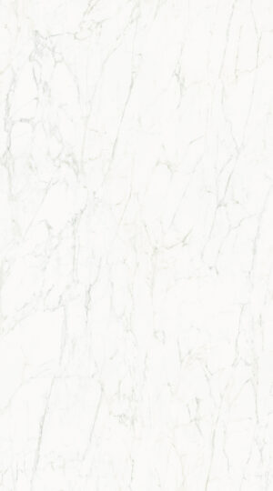 Sourced from the Apuan Alps, Calacatta Caldia porcelain exudes luminous warmth and harmony. Its ivory-white base glows with crystalline brightness, graced by elegant silver-gray and gold veining, with gentle whispers of mint or amber for a subtle, timeless beauty. Versatile and refined, Calacatta Caldia brings understated luxury to classic or modern spaces alike. Its fluid pattern and balanced tones enrich floors, walls, and bespoke furnishings, transforming interiors into serene showcases of Italian design.