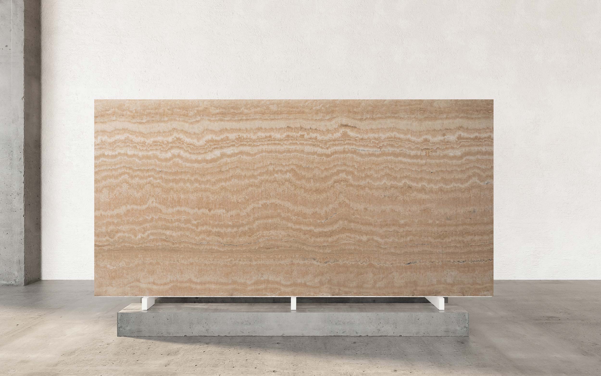 Navona Travertine, quarried near the historic town of Tivoli, Italy, is celebrated for its vein-cut linear pattern and creamy warmth. The filled and honed finish gives it a smooth, matte surface that highlights delicate bands and softens reflections for a serene, refined appearance. Its versatile nature makes it ideal for floors, walls, countertops, and backsplashes, delivering timeless visual flow and practicality to both modern and classic interiors.