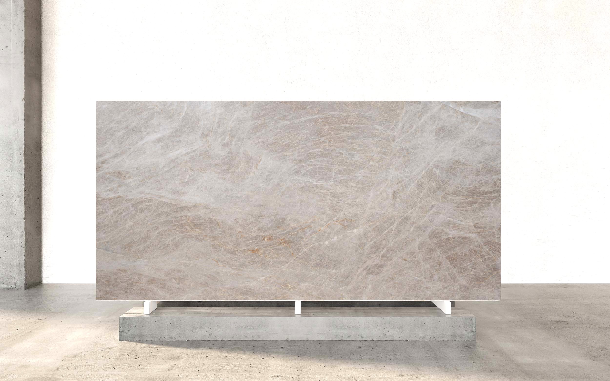 Taj Italy Quartzite exudes timeless elegance with its polished surface and intricate natural patterns. The stone features a harmonious blend of light beige and cream tones, accentuated by striking white and light gray veins that crisscross its surface. Subtle hints of darker reddish-brown and golden hues add depth and warmth, creating a sophisticated yet organic aesthetic. The polished finish enhances its natural luster, reflecting light beautifully and highlighting the intricate details of its veining. Renowned for its durability and versatility, Taj Italy Quartzite is an ideal choice for both functional and decorative applications. Whether used for kitchen countertops, feature walls, or flooring, its robust composition ensures lasting beauty in high-traffic areas. The stone’s neutral palette and refined texture make it a perfect fit for modern, minimalist designs or as a complement to more traditional interiors, transforming any space into a showcase of natural artistry.